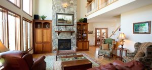 Great room with stone fireplace.